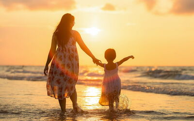Mother and child on a beach
