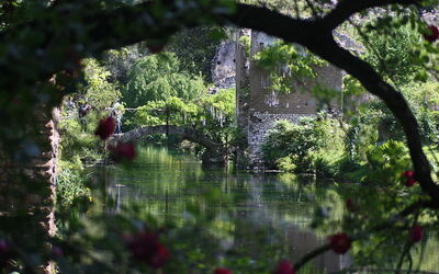 View across water at the Gardens of Ninfa