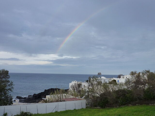 Strombolicchio and rainbow