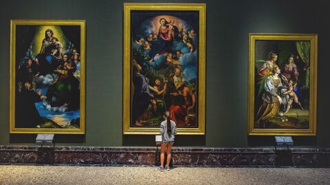 A visitor enjoying the Pinacoteca di Brera