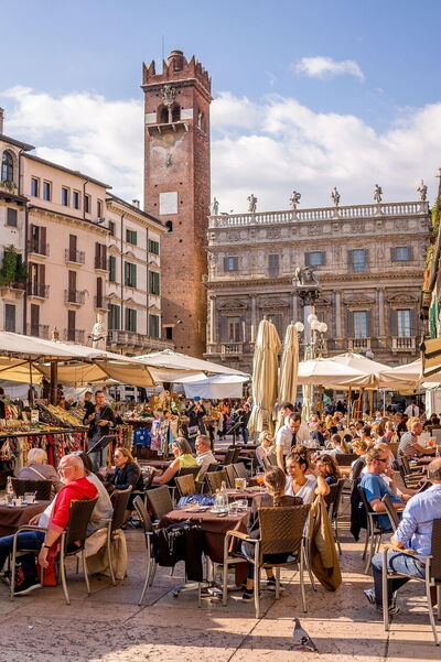 Eating at a market Verona