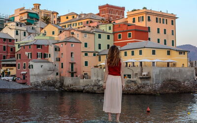 A woman taking in a view along the Italian Riviera