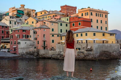 A woman taking in a view along the Italian Riviera