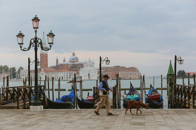 Walking in Venice with a dog