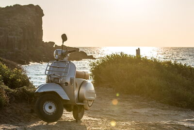 A scooter by the sea in Italy