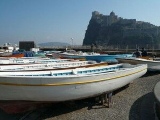 boats at Ischia and Castello Aragonese on the background