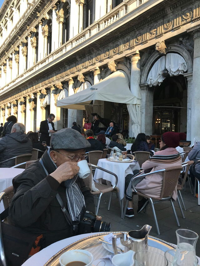 A man enjoying a coffee in Italy