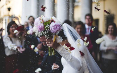 Couple leaving a wedding ceremony