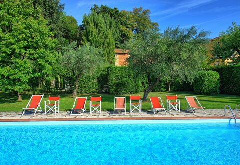 Villa Fiamma: Water, Sky, Plant, Nature, Cloud, Tree, Natural Landscape, Swimming Pool, Leisure, Grass