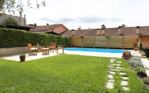 Antonietta: Grass, Property, Yard, Lawn, Backyard, Artificial Turf, Garden, Land Lot, Courtyard, House