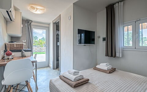 Trulli Itaka: Property, Room, Furniture, Interior Design, Building, Bedroom, House, Real Estate, Floor, Home