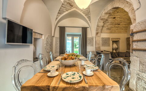 Trulli Itaka: Room, Table, Interior Design, Property, Dining Room, Restaurant, Yellow, Architecture, Arch, Building