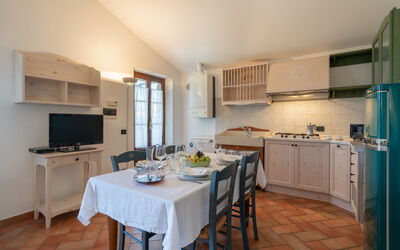 Appartamento Ortensia in Siena, Pool Use, Ac: Countertop, Cabinetry, Furniture, Property, Table, Building, Kitchen Appliance, Home Appliance, Kitchen, Wood