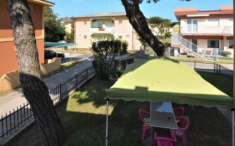 Rosolina Mare 500: Property, Table, Tree, Shade, Grass, Real Estate, Furniture, Plant, Leisure, House