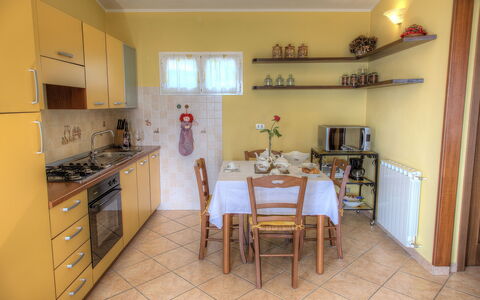 Casa Ilaria - Diano Marina: Property, Room, Kitchen, Furniture, Building, Yellow, House, Real Estate, Interior Design, Cabinetry