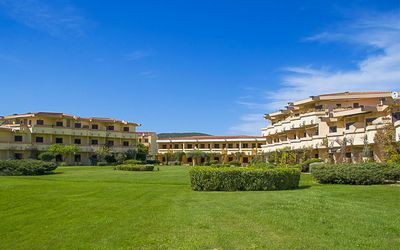 Golfo Aranci Ortensia Apartments: Property, Sky, Building, Grass, Estate, Architecture, Town, Human Settlement, Real Estate, Residential Area