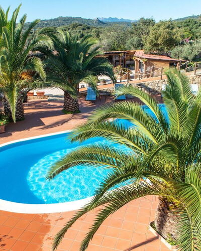 Residence Villa Smeralda: Water, Plant, Property, Tree, Sky, Azure, Swimming Pool, Arecales, Vegetation, Leisure