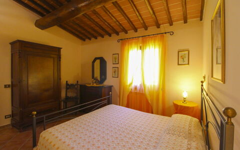 Villa le Balze: Furniture, Wall, Interior Design, Bed, Wood, Bedroom, Flooring, Floor, Ceiling, Room