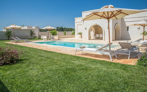 Il Casalino - Corte dei Messapi: Sky, Plant, Shade, Land Lot, Swimming Pool, Grass, House, Landscape, Real Estate, Outdoor Furniture