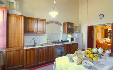 Galleria di Brolio: Furniture, Interior Design, Flooring, Kitchen, Room, Floor, Ceiling, Countertop, Kitchen Appliance, Cabinetry