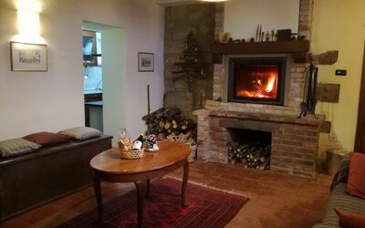 La Fattoria: Hearth, Fireplace, Room, Property, Living Room, Heat, Interior Design, Furniture, Home, Building