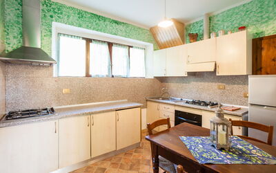 Rosa: Property, Room, Countertop, Kitchen, Furniture, Building, Interior Design, Cabinetry, House, Real Estate