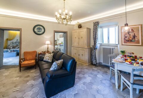 Michelangelo Cortona Apartment: Room, Property, Living Room, Furniture, Interior Design, Real Estate, Building, Blue, Yellow, Home