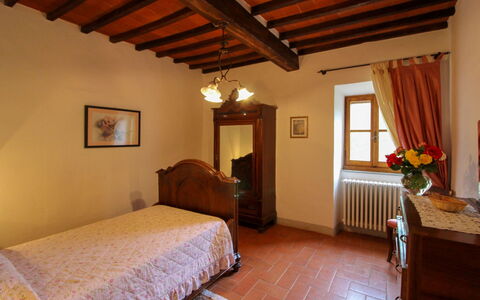 Borgo di Usciano: Furniture, Wall, Interior Design, Wood, Bedroom, Flooring, Bed, Floor, Ceiling, Bed Sheet
