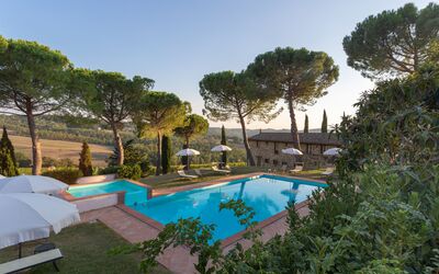 Fattoria Della Pesa: Water, Plant, Sky, Property, Building, Swimming Pool, Tree, Shade, Arecales, Vegetation