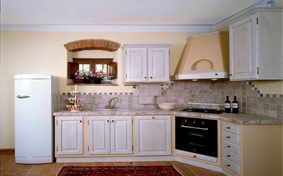 Giotto: Cabinetry, Countertop, Room, Kitchen, Furniture, Property, Interior Design, Tile, Floor, House