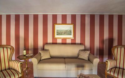 Appartamento 12 Malvasia: Room, Living Room, Furniture, Interior Design, Property, Couch, Wall, Curtain, Suite, Window Covering
