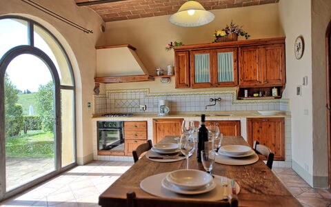 I Glicini: Property, Furniture, Cabinetry, Countertop, Tableware, Wood, Interior Design, Kitchen, Table, Lighting