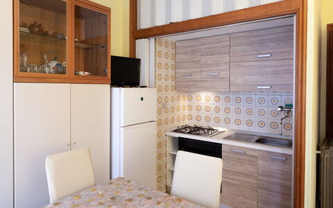 Eveten Apartments - Diano Marina: Room, Property, Tile, Furniture, Cabinetry, Countertop, Interior Design, Floor, Kitchen, Building