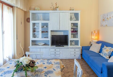 Eveten Apartments - Diano Marina: Furniture, Room, Living Room, Blue, Property, Interior Design, Wall, Home, Building, Yellow
