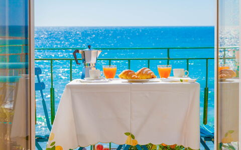 Il Balcone Sul Prino - Imperia: Water, Tableware, Table, Furniture, Blue, Tablecloth, Azure, Sky, Textile, Chair