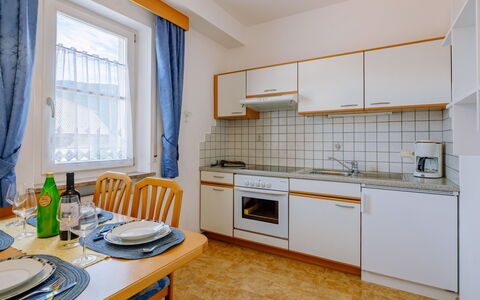 Andriano 602: Cabinetry, Countertop, Furniture, Property, Sink, Kitchen Sink, Window, Kitchen Stove, Kitchen, Wood