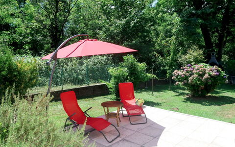 Casa dei Fiori: Property, Red, Yard, Backyard, Garden, Umbrella, Furniture, Patio, Grass, Lawn