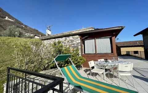 Sofia (Dma333): Sky, Building, Property, Window, Plant, Table, House, Chair, Wood, Shade