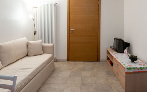 La Casetta (Cco107): Furniture, Property, Building, Comfort, Flooring, Wood, Interior Design, Floor, Door, Living Room