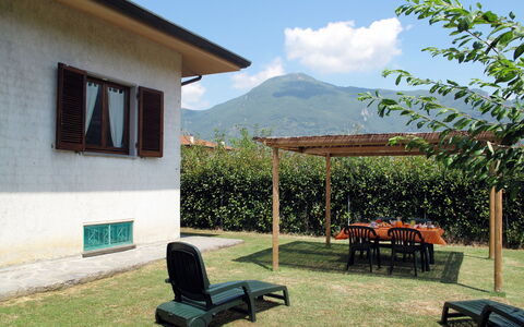 Emilia: Lawn, Shade, Outdoor Furniture, Garden, Mountain Range, Backyard, Outdoor Table, Yard, Outdoor Structure, Farmhouse