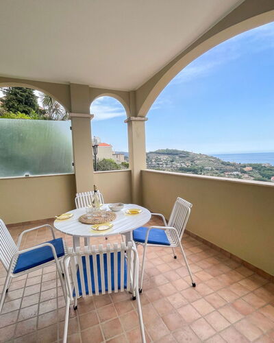 Pietra Ligure 612: Table, Furniture, Property, Chair, Sky, Azure, Shade, Water, Plant, Wood