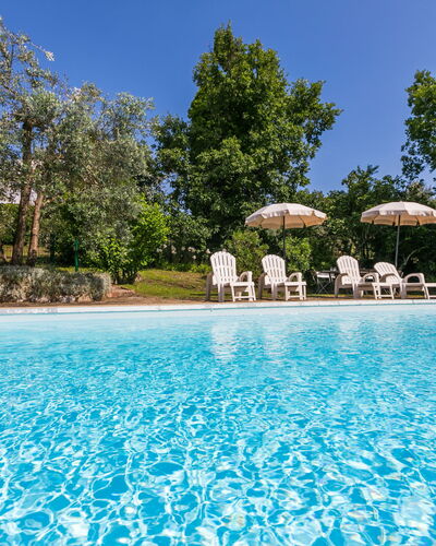 Il Laghetto: Water, Plant, Sky, Property, Swimming Pool, Tree, Azure, Natural Landscape, Leisure, Real Estate