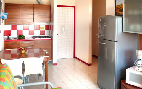 Bibione 660: Room, Property, Floor, Interior Design, Furniture, Building, Major Appliance, Orange, Kitchen, Cabinetry