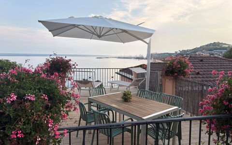 Irma: Furniture, Umbrella, Outdoor Furniture, Table, Chair, Outdoor Table, Shade, Balcony, Kitchen & Dining Room Table, Eco Hotel