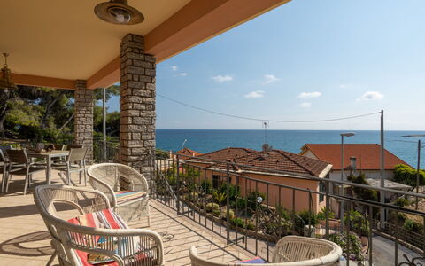 Irma: Sky, Plant, Building, Property, Cloud, Seaside Resort, Water, Chair, Shade, Flowerpot