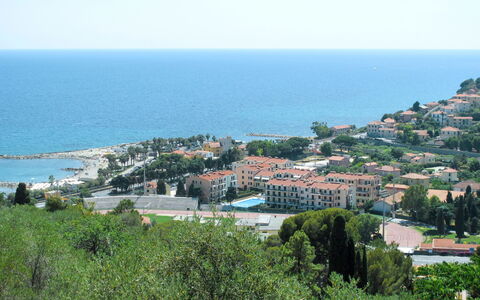 Cala Azzurra (Imp312): Water, Sky, Plant, Azure, Building, Tree, Vegetation, Coastal And Oceanic Landforms, Urban Design, Horizon