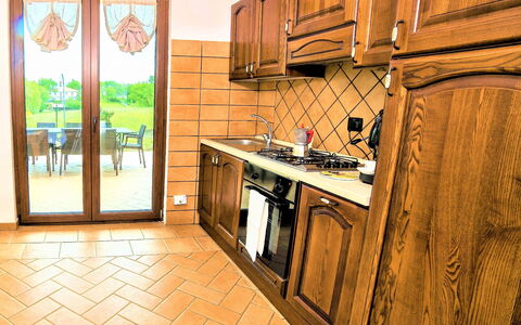 I Gigli di Montefiascone: Kitchen, Flooring, Wood, Interior Design, Floor, Countertop, Furniture, Major Appliance, Cabinetry, Kitchen Appliance