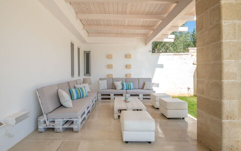 Villa Niraclo': Couch, Property, Furniture, Comfort, Interior Design, Shade, Living Room, Studio Couch, Flooring, Floor
