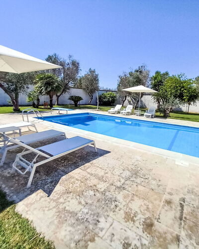Giusy: Swimming Pool, Resort, Outdoor Furniture, Furniture, Sunlounger, Landscaping, Estate, Shade, Garden, Flagstone