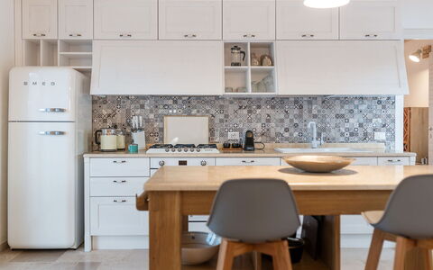 Villa Amelia: Cabinetry, Furniture, Property, Building, Countertop, Kitchen, Wood, Chair, Drawer, Home Appliance